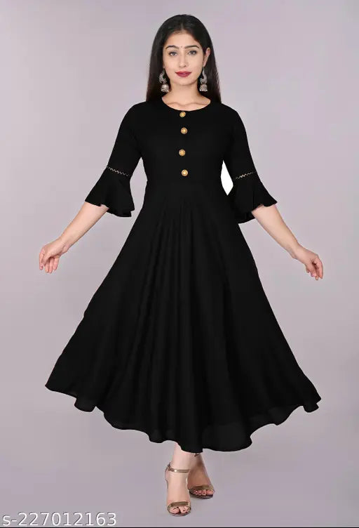 Unique Stylist black rayon round flared kurti with three-quarter sleeves, perfect for casual and formal occasions. Machine washable, hand wash recommended for best results. Size range: XS (Bust 34", Length 48") - XXXL (Bust 46", Length 48"). Color may vary due to lighting sources or monitor settings. Made in India
