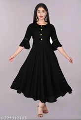 Unique Stylist black rayon round flared kurti with three-quarter sleeves, perfect for casual and formal occasions. Machine washable, hand wash recommended for best results. Size range: XS (Bust 34", Length 48") - XXXL (Bust 46", Length 48"). Color may vary due to lighting sources or monitor settings. Made in India