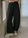 Straight-fit black joggers with pockets, solid net fabric for women's sleepwear. Made in India