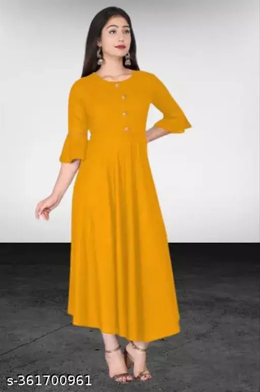 Mustard rayon Anarkali kurti with gown flare and three-quarter sleeves, stylish ethnic wear for women's casual or formal occasions