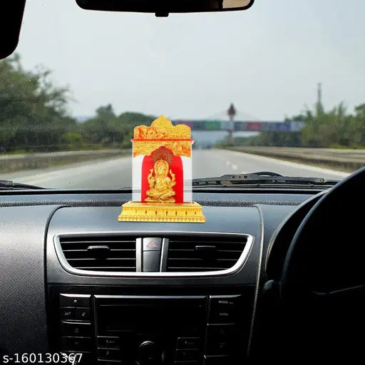 Gold-plated handpainted Ganesha idol for car decor or home showpiece, intricate detailing, popular Lord Ganesha design from India