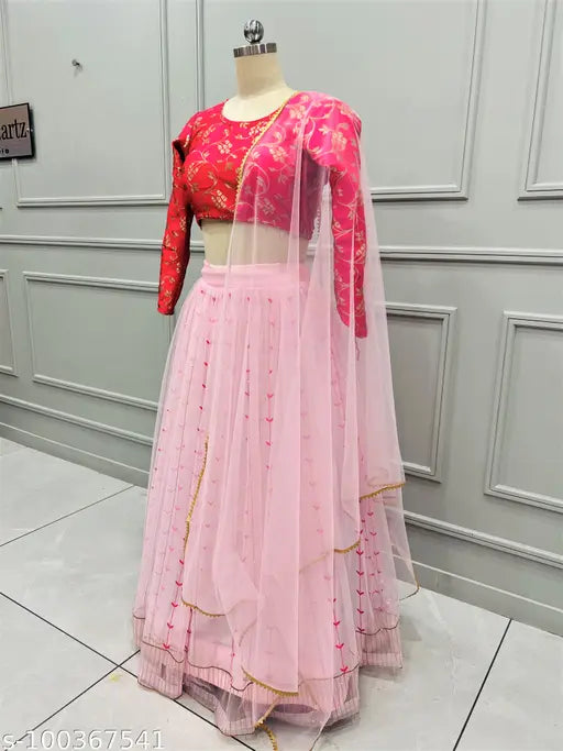 Art Silk net lehenga choli with embroidered embellishments, semi-stitched with a zipper and dori closer. Indian designer net dupatta included