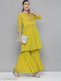 Lime yellow Georgette embroidered kurta with sharara, features mirror work and geometric patterns