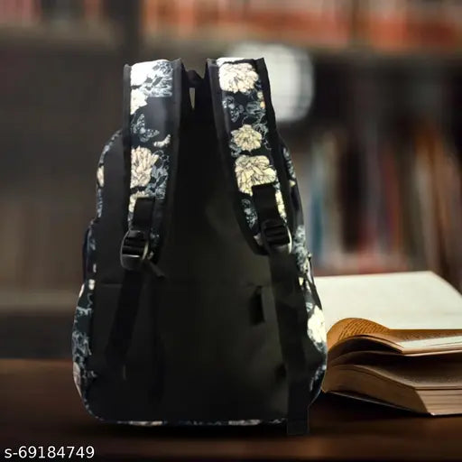 Black polyester Tinytot travel backpack, 18 inches, 20 litres - ideal for school/college use by girls and women, featuring a single compartment and zipper closure