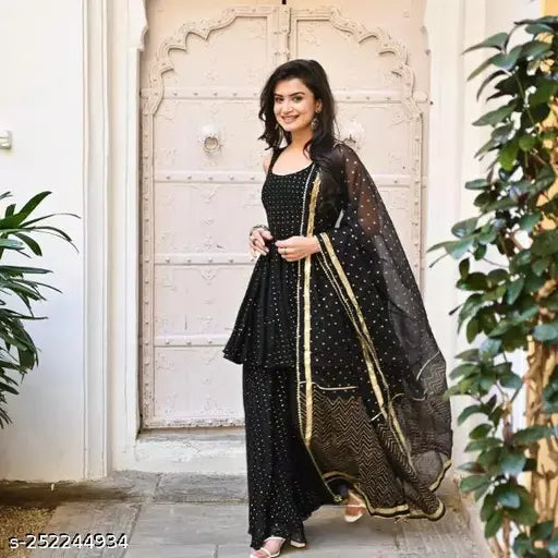 Black rayon Palazzo dupatta set with embellished kurta and bottomwear, perfect for party wear events on display