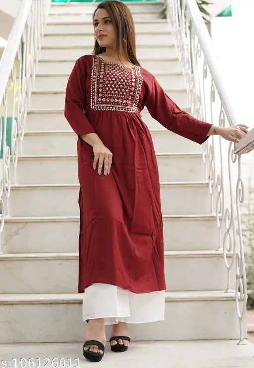 Rayon two-tone Rara Handicrafts kurta with beautiful embroidery, solid net pattern, three-quarter sleeves, and palazzos bottomwear for women's casual wear