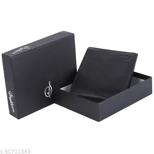 Black genuine leather men's wallet by SHUBHAM, features 6 slots, 3 secret compartments, coin pocket, and ID window. Durable polyester lining. Perfect for gifting, handcrafted in India