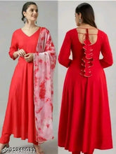 Red chiffon gown, solid design with three-quarter sleeves on mannequin