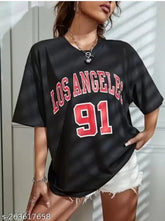 Oversized cotton-blend t-shirt for women in Los Angeles design, off-shoulder style. Available in lavender, white, mustard, black, navy, blue, maroon, red, and size options from XS to XXL. Made in India