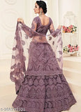 Embroidered Kalidar free size net lehenga choli set with embellished dupatta, traditional Indian wedding attire on mannequin