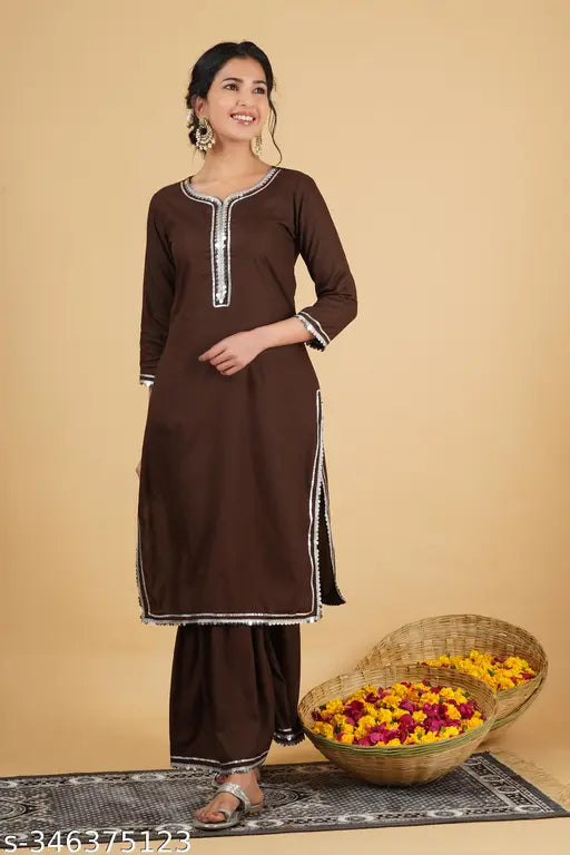 Coffee-colored rayon solid printed Kurta Palazoo set, three-quarter sleeves, gharara style, Indian traditional clothing on mannequin