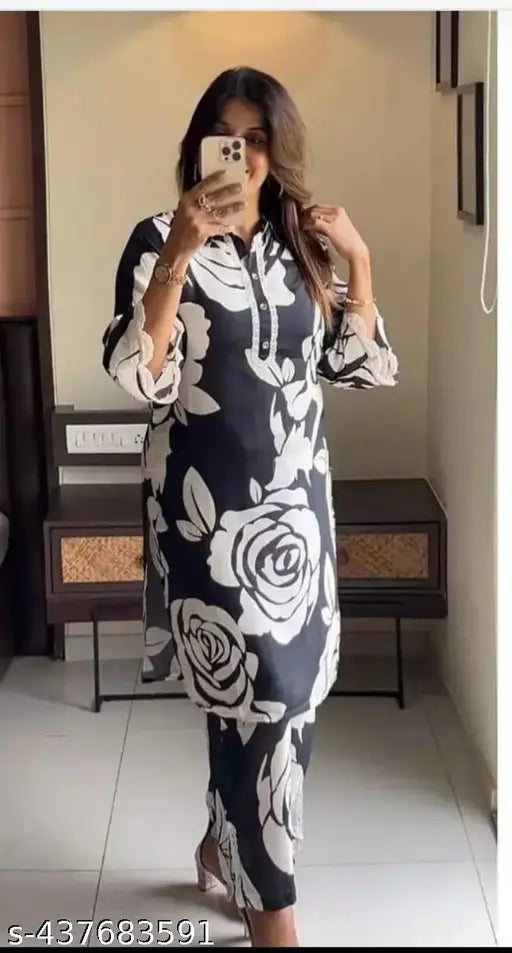 Black rayon kurta pant set, three-quarter sleeves, printed design by Neel Fashion & Art Gallery on display stand, Pack of 2 (S/M: 11in bust, 32in waist; L/XL: 10in bust, 34in waist)