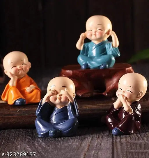 Multicolor polyresin baby monk Buddha set of 4 decorative showpieces, handcrafted from India