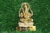 Gold brass Ganesh statue for wealth, shining future decorative home decor - 4 inch (11x7.5x1 cm)