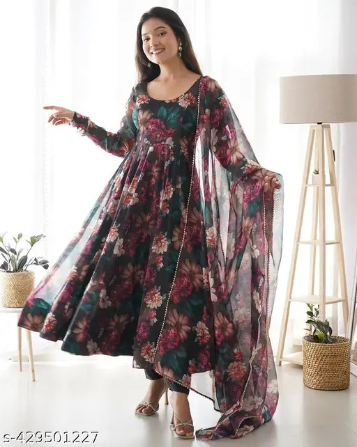 Black Georgette printed maxi dress with long sleeves and dupatta, ideal for special occasions. Size: S-XXXL. Stunning floral pattern, made in India." (125 characters)