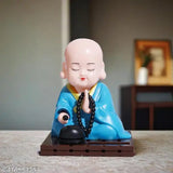 Solar powered Buddha monk statue, enhances health, wealth & prosperity for car dashboard, home, or office desk
