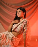 White Georgette embroidered saree with banarasi silk blouse piece, adorned with sequins and zari woven patterns