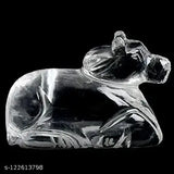 Natural Quartz Crystal Sphatik Nandi statue for Pooja, home decor, or car dashboard. Dimensions: 4.5cm (L) x 3.5cm (H) x 1.5cm (W). Symbolizes strength, wealth, and harmony. Made in India