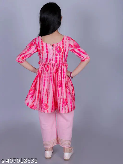 Pink cotton tie-dye Anarkali flared kurta & pant set for girls, soft, comfortable, and breathable. Features gold foil print design, available in multiple sizes from 12 months to 9 years. Made in India
