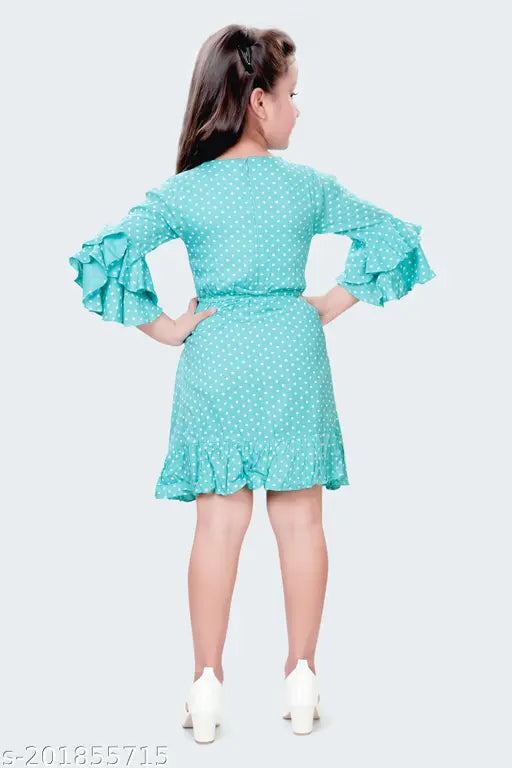Green polyester three-quarter sleeve self-design net midi dress for girls (5-6yrs, 25in bust/24in length; 6-7yrs, 26in bust/26in length; 7-8yrs, 27in bust/28in length; 13-14yrs, 35in bust/35in length), features lining, zipper back, and knots on front. Pure cotton dress with frills, suitable for parties, casual wear, daily wear, and various occasions. Indian origin