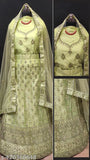 White embroidered net lehenga choli set with dupatta, free size from Gopinath Enterprise, India