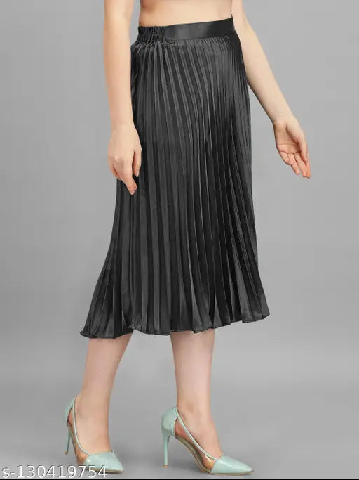 Satin pleated midi skirt, stretchy and trendy for women's western wear. Full-length, elastic waistband, flared hemline. Rich, wrinkle-free satin fabric. Sizes from 28 to free size. Indian origin