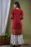 Red and White Premium Rayon printed kurti and palazzos set, featuring three-quarter sleeves and a round neck. Highlighted print design for a stylish, comfortable feel