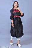 Black cotton empire kurta with belt, three-quarter sleeves, embroidered yoke, featuring tasseled belt – Indian designer festive wear