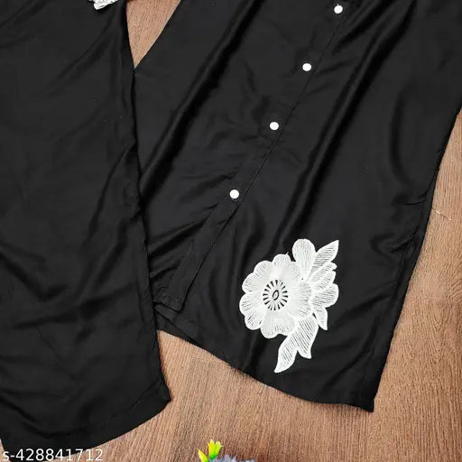 Rayon embroidered top and bottom set for women and girls. Three-quarter sleeves, various sizes available. Indian handcrafted rayon attire