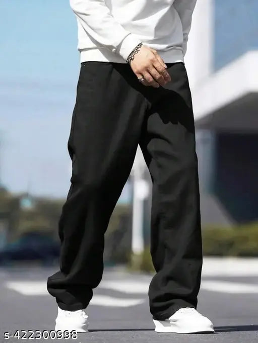 Boy baggy black oversized jeans, denim with solid pattern, fashionable casual wear for men