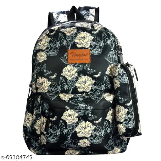 Black polyester Tinytot travel backpack, 20 litres, ideal for school or college trips for girls and women