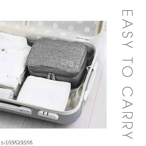 Three-layer grey fabric travel cable organizer for iPad Mini, Kindle, hard drives, cables, and chargers