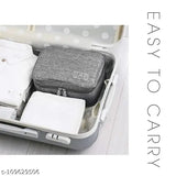 Three-layer grey fabric travel cable organizer for iPad Mini, Kindle, hard drives, cables, and chargers