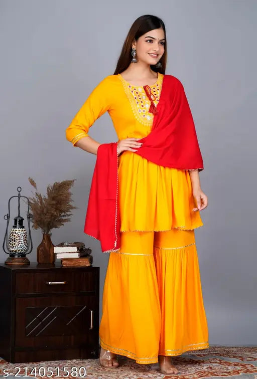 Yellow Rayon Kurta Set with Sharara and Dupatta, three-quarter sleeves, solid pattern. Indian women's traditional wear in vibrant style