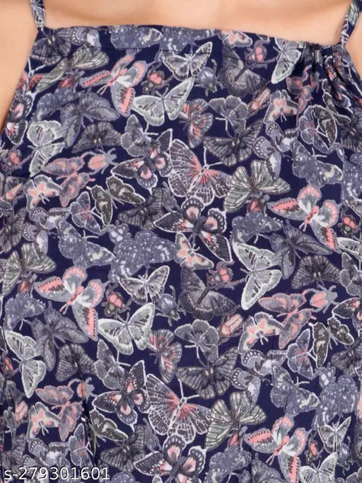 Sleeveless printed net rayon dress from India, vibrant pattern on a size S