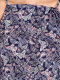 Sleeveless printed net rayon dress from India, vibrant pattern on a size S
