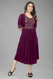 Purple rayon embroidered kurta with three-quarter sleeves. Traditional Indian fashion for functions, festivals, and weddings." (104 characters)