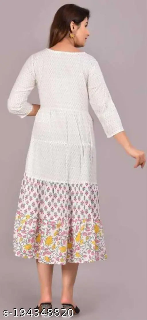Multicolor rayon Anarakali floral print kurti for parties, three-quarter sleeves, white embroidered details, Indian ethic wear on display