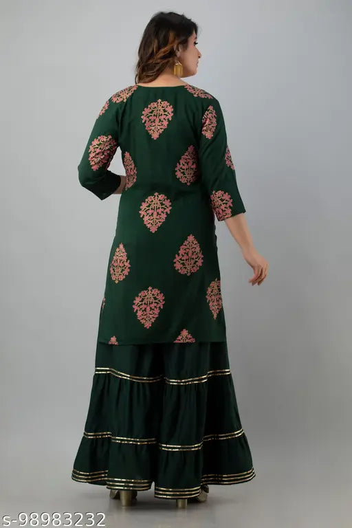 Anushka Sharara dupatta set, rayon fabric with lace work, printed Indian Kurta and bottomwear on display