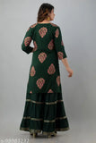 Anushka Sharara dupatta set, rayon fabric with lace work, printed Indian Kurta and bottomwear on display
