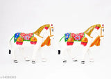 Handmade white set of 2 paper mache horses, intricately engraved, perfect for home decor or gifting, traditional Indian artwork