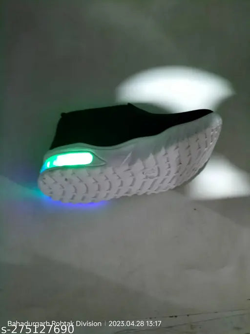 Light zim zom green foamed sole PVC slip-on shoes for toddlers aged 18 months to 4 years, featuring a printed pattern and various sizes available