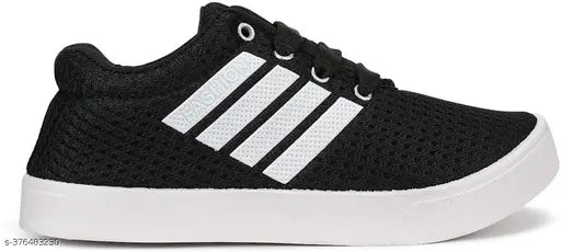 Black canvas casual sneakers for boys, lace-up design with PVC sole, perfect for active play and comfort