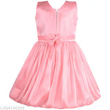 Silver kraft peach pleated knee-length frock, sleeveless A-line dress with V-neck and gathering on waist, organza fabric, zipper closure and tie-ups for better fitting. Party wear for girls ages 3-5 years old, India origin