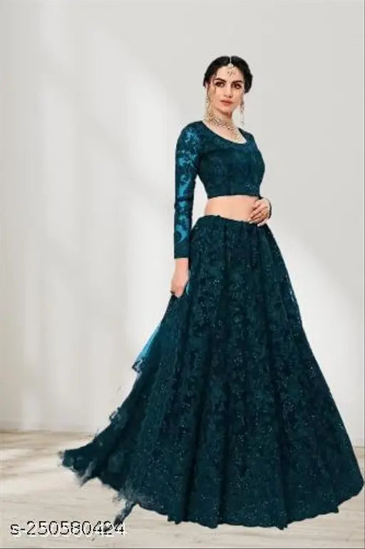 Teal embroidered net Lehenga Choli with sequinned dupatta - Indo Western party wear. Intricate embroidery, long-sleeved blouse, flared lehenga, sequinned dupatta, semi-stitched (42m/44m/2.2m). Elevate festive style in this elegant Teal Lehenga Choli set