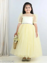 Lemon yellow net party dress for kids, full length with short sleeves, toy balloon print on display