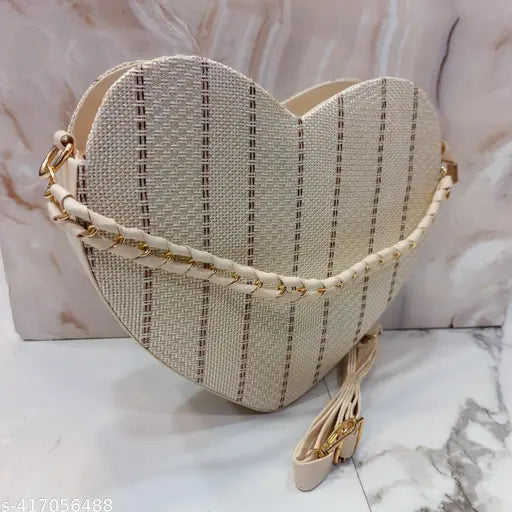 Soft jute heart-shaped sling bag for women, girls and females with detachable shoulder belt and knot design handheld handle, perfect for daily casual use