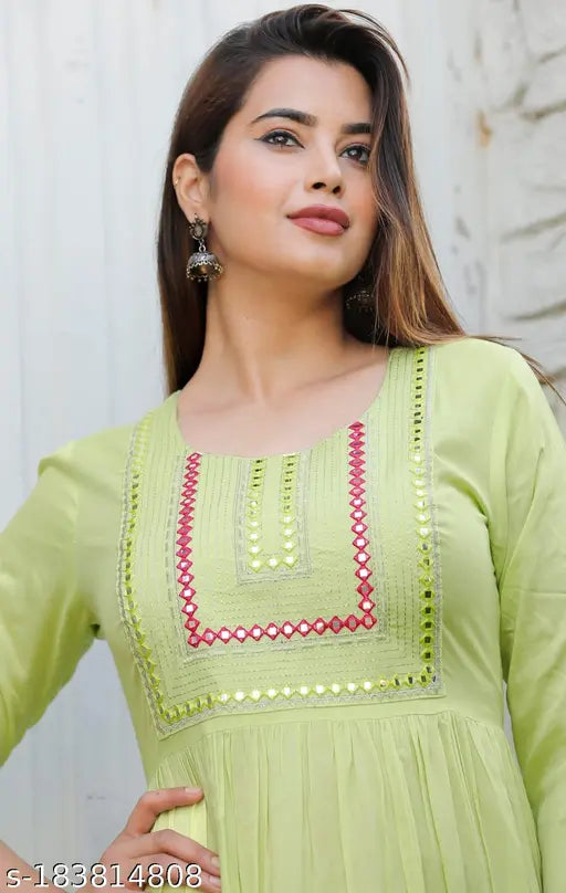 Rayon solid print flair kurti with embroidery detail, great for festivals or formal wear, India-origin women's fashion