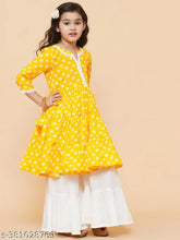 Yellow rayon printed Sharara haldi dress for girls, A-line top with three-quarter sleeves, knee-length