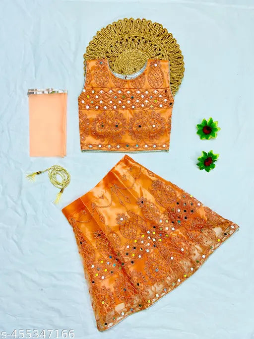 Embellished kids lehenga choli set in super net, premium quality Indian mirror work on display